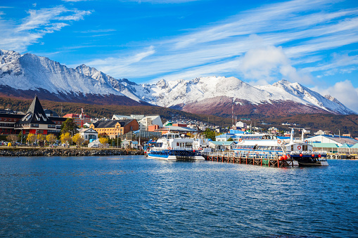 Catamaran boats in the Ushuaia harbor port. Ushuaia is the capital of Tierra del Fuego province in Argentina.