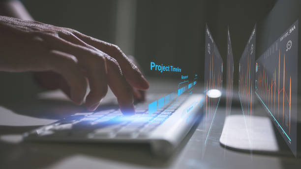 istock Project manager working on laptop and updating tasks and milestones progress planning Business Project Management System, hand typing on computer keyboard 2149110460