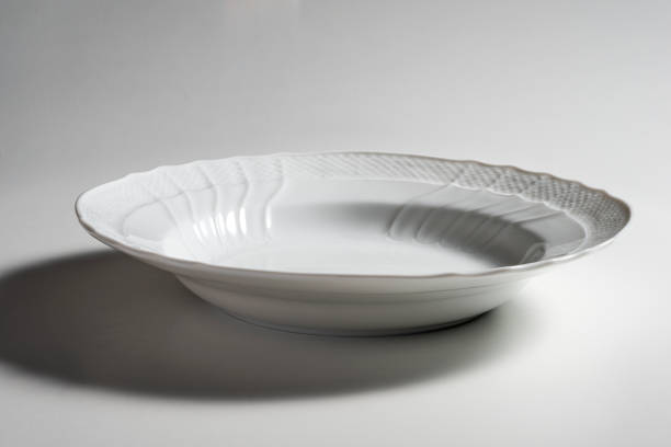 istock Empty white soup plate bowl with elegant classic decorations 2149110853