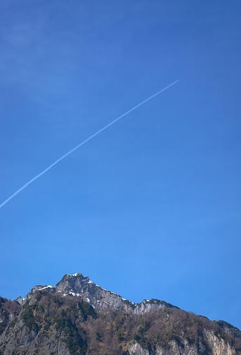 Background with blue sky, mountain in the distance in vertical format