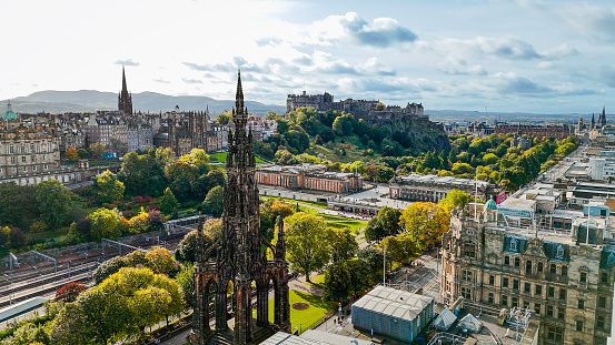 Aerial view of Edinburgh Scott monument, aerial view of the Scott Monument located in the Old Town and Princess Street in Edinburgh, Scott Monument in Edinburgh city centre, Gothic Revival architecture in Scotland, A Victorian Gothic monument to the Scott

The Scott Monument is a Victorian Gothic monument to the Scottish writer Sir Walter Scott.

Edinburgh is the capital city of Scotland and one of its 32 council areas. The city is located in south-east Scotland, and is bounded to the north by the Firth of Forth estuary and to the south by the Pentland Hills. Edinburgh had a population of 506,520 in mid-2020, making it the second-most populous city in Scotland and the seventh-most populous in the United Kingdom.