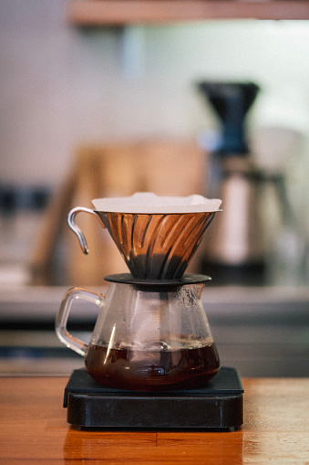Brewing coffee with v60 equipment stock photo
