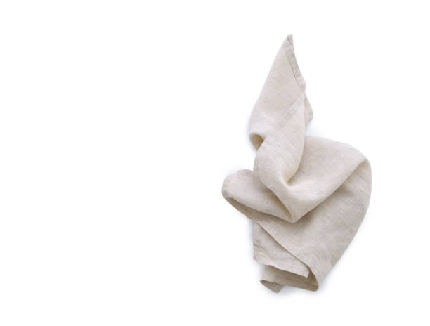 istock Flat lay with beige linen kitchen napkin isolated on white background. Folded cloth for mockup 2149112266