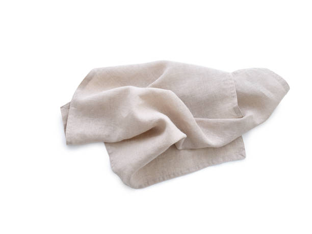 istock Flat lay with beige linen kitchen napkin isolated on white background. Folded cloth for mockup 2149112271