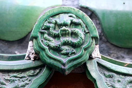 Traditional architectural features of dragons at the Mukden Palace, or Shenyang Imperial Palace, the former palace of the Later Jin dynasty and the early Qing dynasty. It was built in 1625, and the first three Qing emperors lived there from 1625 to 1644. It lies in the center of Shenyang, Liaoning.