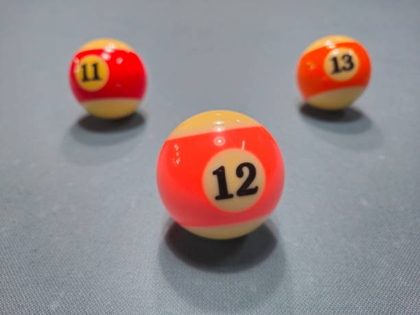 istock Pool balls on gray table sport game billiards known as eight ball pool. 2149113656