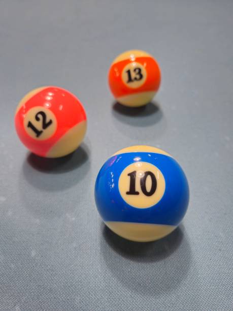 istock Pool balls on gray table sport game billiards known as eight ball pool. 2149113657