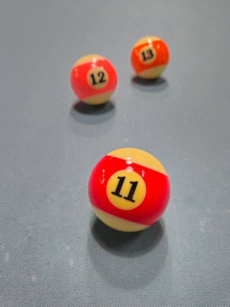 istock Pool balls on gray table sport game billiards known as eight ball pool. 2149113659