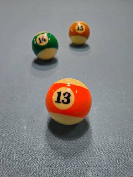 istock Pool balls on gray table sport game billiards known as eight ball pool. 2149113661