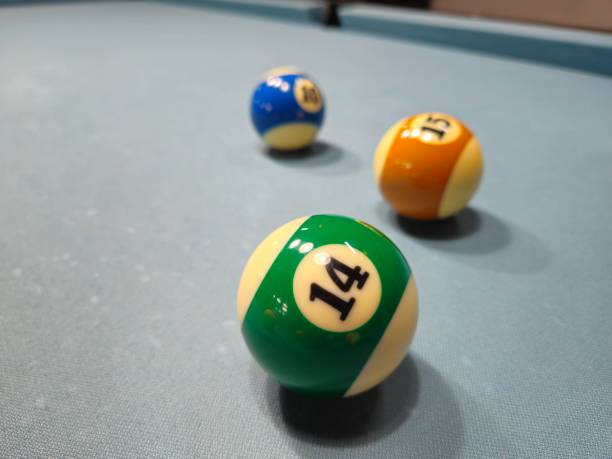 istock Pool balls on gray table sport game billiards known as eight ball pool. 2149113663