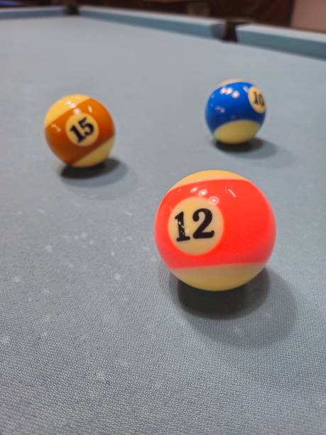 istock Pool balls on gray table sport game billiards known as eight ball pool. 2149113671