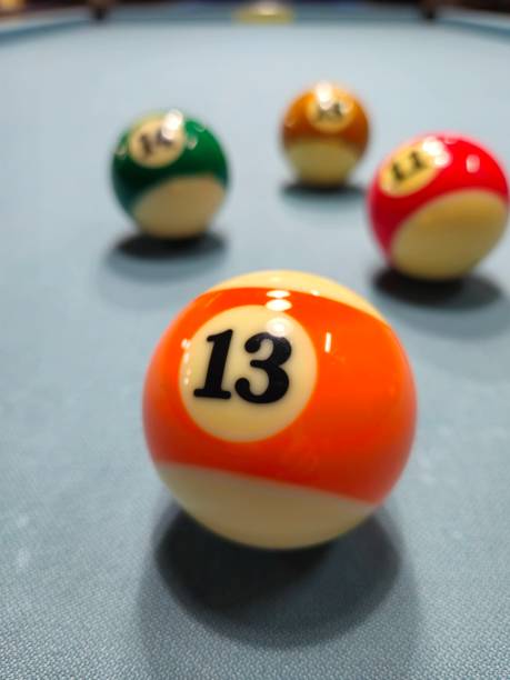 istock Pool balls on gray table sport game billiards known as eight ball pool. 2149113680