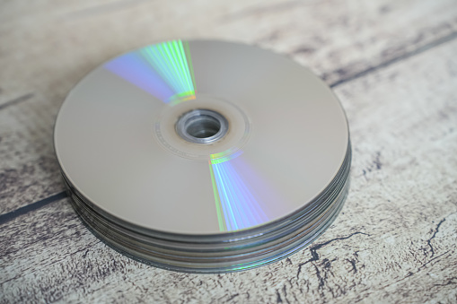 Stack of Blu-Ray disk with disk writer