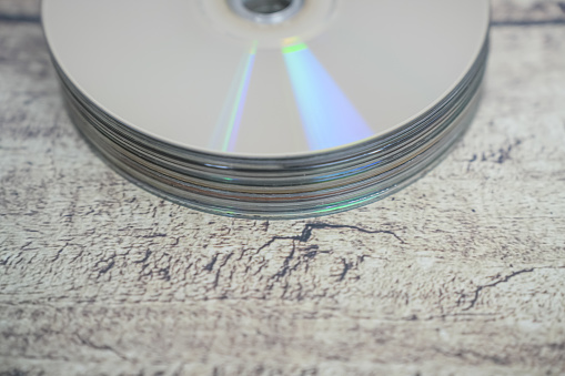 Stack of Blu-Ray disk with disk writer