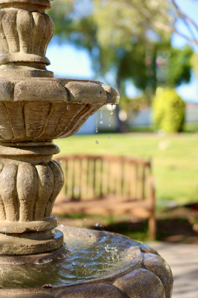 istock Tall water fountain in the garden 2149116244