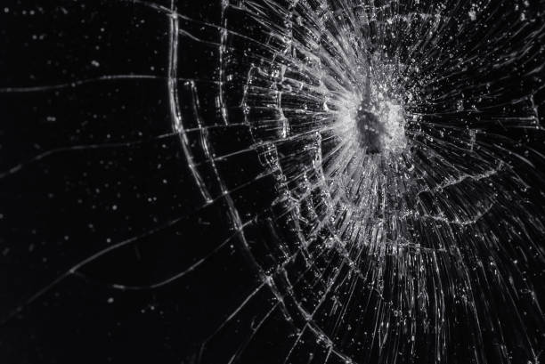 istock Broken glass texture on black background. Abstract of cracked screen smartphone from shock. 2149116301