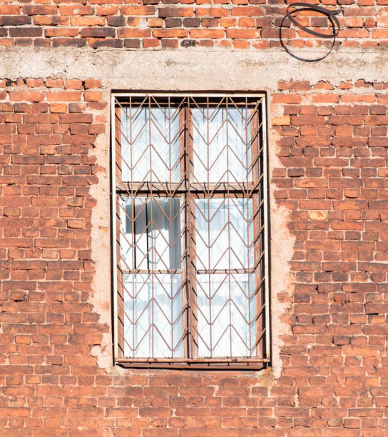istock Windows on the wall of an old house 2149118497