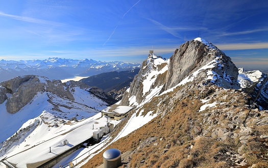 Pilatus, also often referred to as Mount Pilatus, is a mountain massif overlooking Lucerne in Central Switzerland. It is composed of several peaks, of which the highest (2,128.5 m [6,983 ft]) is named Tomlishorn.