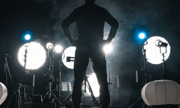 istock Photo Video Studio Worker In Front of Lighting 2149119465