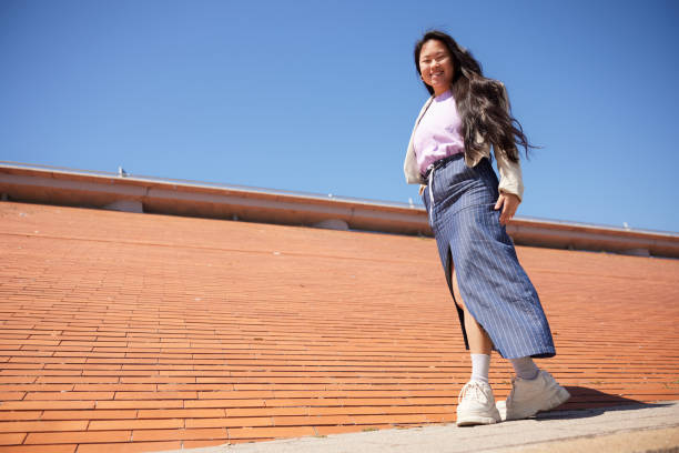 istock Embracing Confidence: The Dynamic Stance of a New Generation 2149119469