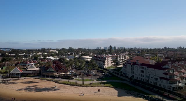 Flying On Coronado Resort City In Downtown Across The Bay In San Diego County, California, United States. Aerial Shot