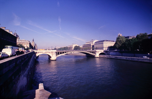 Paris cityscape with the bridge Pont d'Arcole over the River Seine in Paris during 1990s