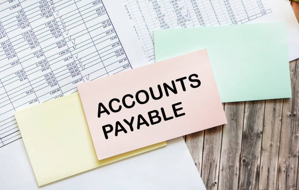 istock Business concept. Text ACCOUNT PAYABLE on the yellow sticker on payment documents 2149122452