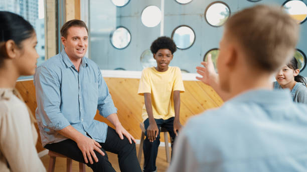 istock Teacher talk about mental health problem and sharing idea with boy. Edification. 2149123014