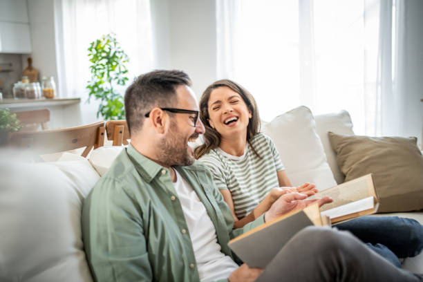 istock Happy Caucasian couple relaxing at home 2149124264