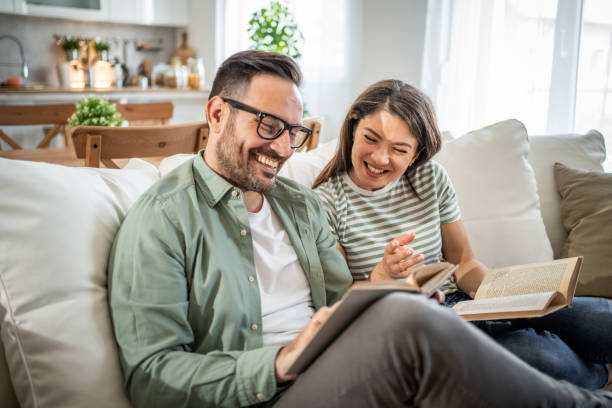 istock Happy Caucasian couple relaxing at home 2149124307