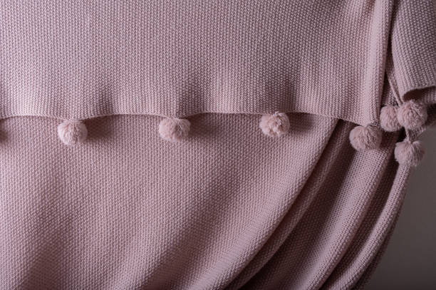 istock The knitted texture is the same color as a dusty rose. 2149125165