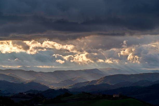 istock view of the light filtering through the clouds on the hills 2149126897