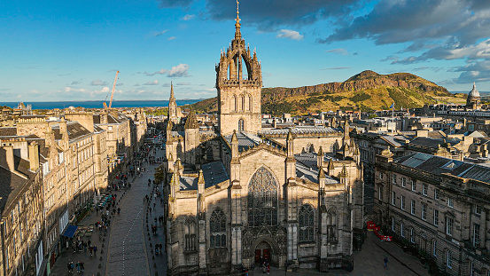 Aerial view of St. Giles Cathedral and Edinburgh old town, Aerial view of Old cathedral in Edinburgh, Saint Giles Cathedral in Edinburgh city centre, Gothic Revival architecture in Scotland

St Giles' Cathedral or the High Kirk of Edinburgh, is a parish church of the Church of Scotland in the Old Town of Edinburgh.