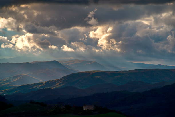 istock view of the light filtering through the clouds on the hills 2149127625