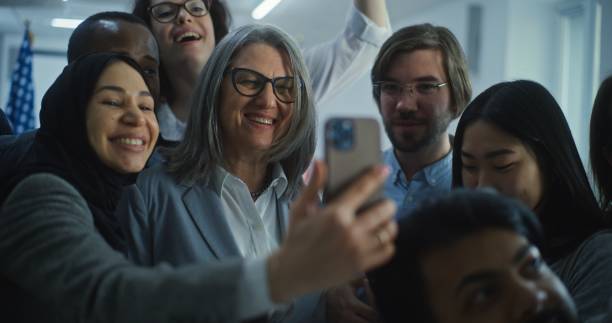 istock Multiethnic people talk and take selfies with female presidential candidate 2149127629