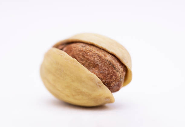 pistachio on a white background. dried nut close up.