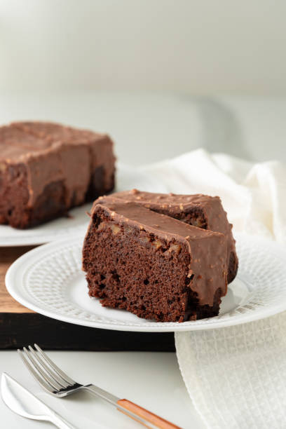 istock Fresh homemade chocolate sponge cake on wooden board 2149130127