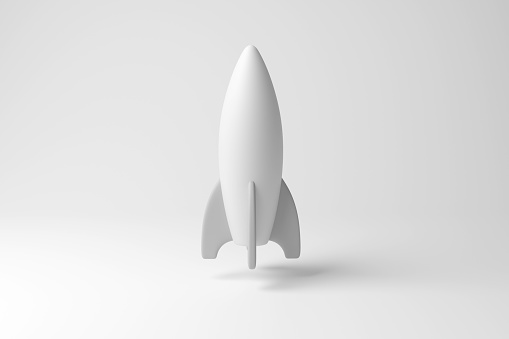 White rocket-like spaceship floating in mid air on white background in monochrome and minimalism. Illustration of the concept of astrology, space exploration and technology