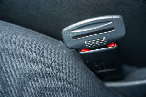 Artificial seat belt plug.Violation of traffic rules. Irresponsible driving and behavior concept. High quality photo