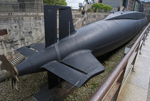 Cherbourg, France - Apr 16, 2024: The Le Redoutable-class submarine was a ballistic missile submarine class of the French Navy. Sunny spring day. Selective focus