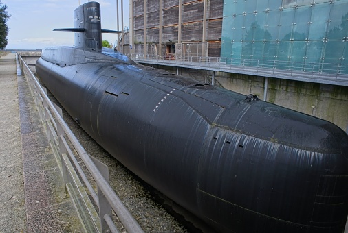 Cherbourg, France - Apr 16, 2024: The Le Redoutable-class submarine was a ballistic missile submarine class of the French Navy. Sunny spring day. Selective focus
