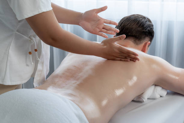 istock Caucasian man customer enjoying relaxing anti-stress massage. Quiescent 2149134630
