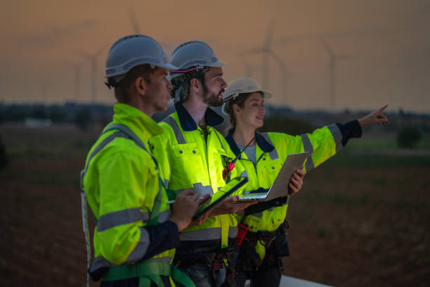 istock Team Engineers men and woman checking and inspecting on construction with sunset sky. people operation. Wind turbine for electrical of clean energy and environment. Industrial of sustainable. 2149136662