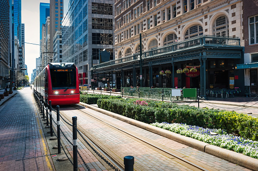 Main street with light-rail train in downtown Houston, Texas, USA.