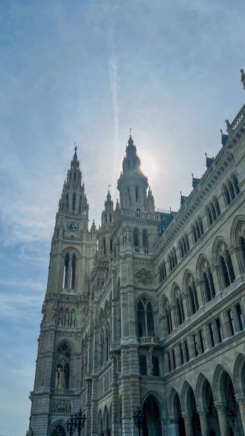 istock View of the City Hall clock tower through the tree branches 2149137842