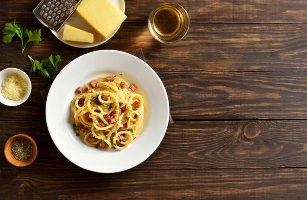 istock Carbonara pasta, spaghetti with crisp pancetta and black pepper 2149137853