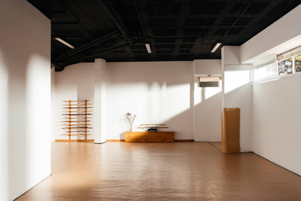 istock Sunlit Martial Arts Dojo With Training Equipment and Wooden Floor 2149139070