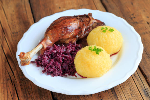 istock Leg of goose with red cabbage and dumplings 2149139232