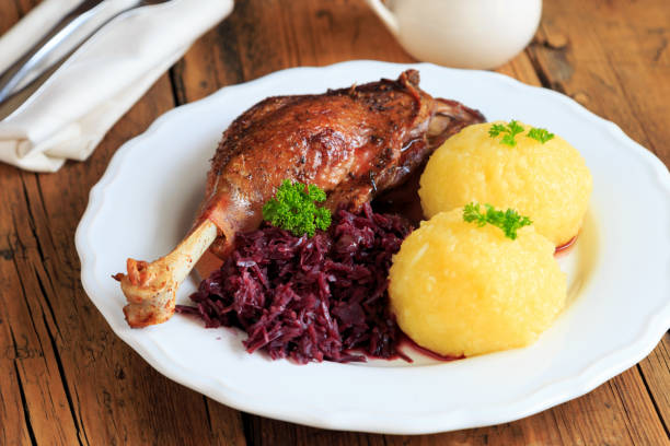 istock Leg of goose with red cabbage and dumplings 2149139240