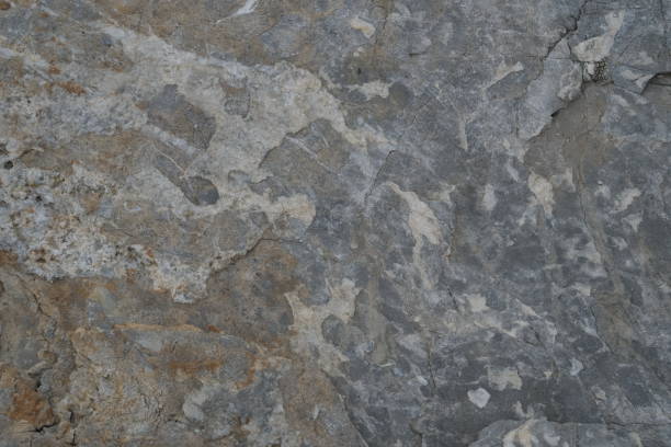 large rock faces by the sea for background